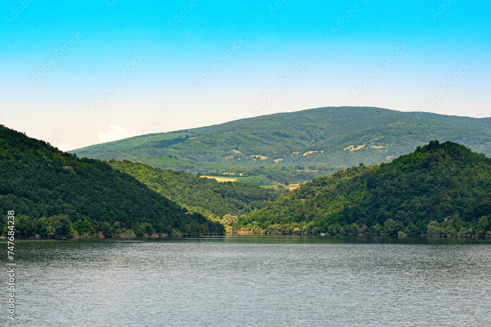 Bovan lake in Serbia near Sokobanja, beautiful view at the mountains on sunset from the lake.