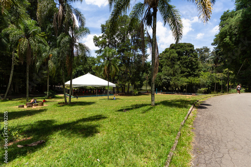SÃO PAULO, SP, BRAZIL - FEBRUARY 10, 2024: People exercising in the tent at Alberto Lofgren State Park, better known as Horto Florestal (Forest Garden).