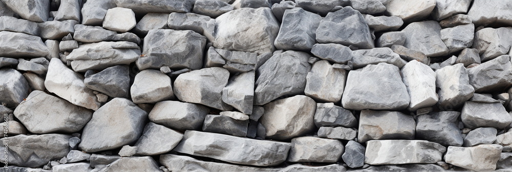 Light gray rock texture background. Rough slate mountain surface. Grey stone background with space for design. Rocky white bricks