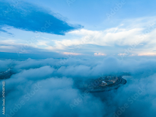 Ocean Flower Island in Zhanzhou, Hainan, China in the early morning white fog