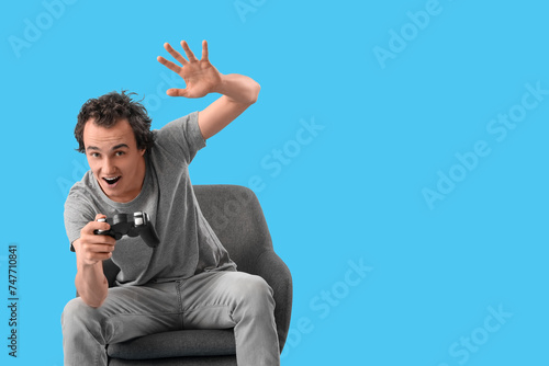 Young man playing video gam...