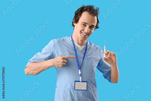 Young doctor pointing at sy...