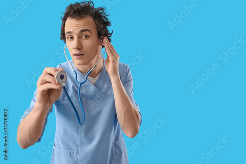Young doctor with stethosco...