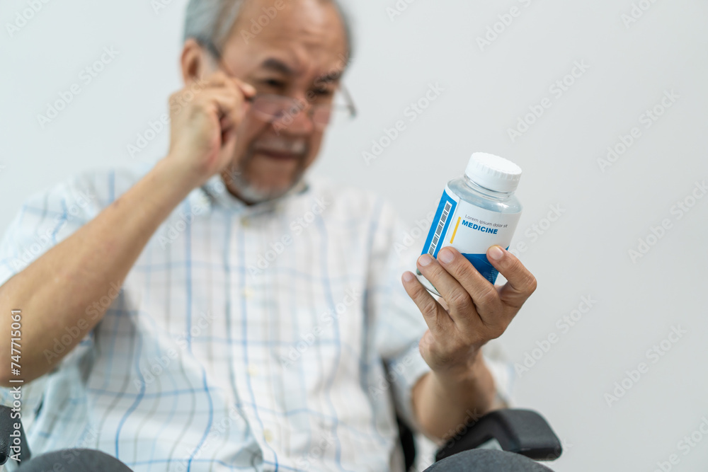 Asian Senior elderly male patient sit on wheelchair at nursing home care. Asian Senior elderly male patient sit on wheelchair at nursing home care.