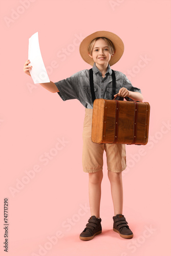Little actor with suitcase ...
