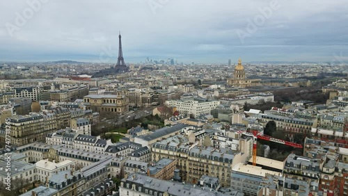 Tour Eiffel and Hotel National des Invalides, Paris urbanscape, France. Aerial sideways photo