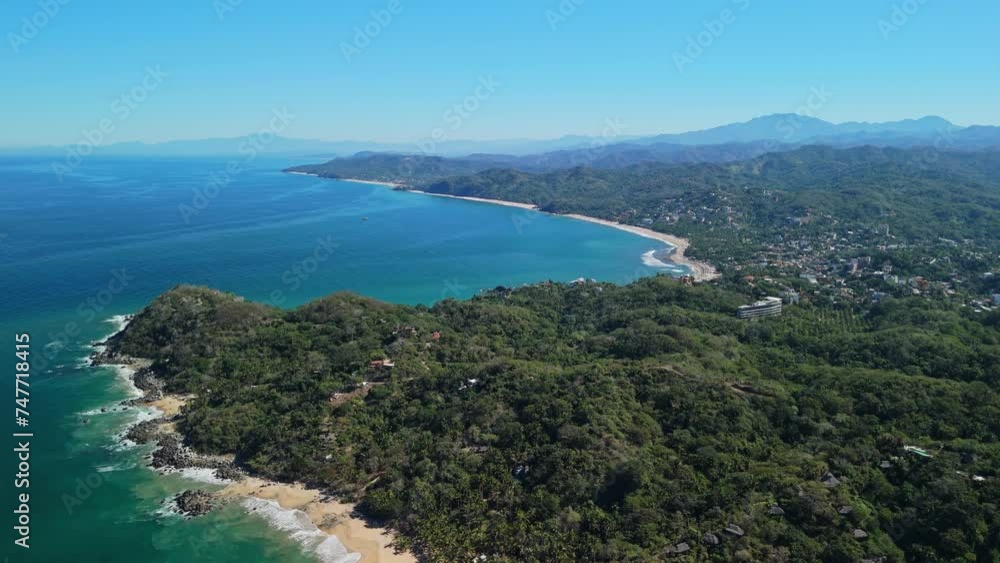 Drone flight around Sayulita, Mexico in Nayarit with clear sky and empty beaches Drone flight around Sayulita, Mexico in Nayarit with clear sky and empty beaches