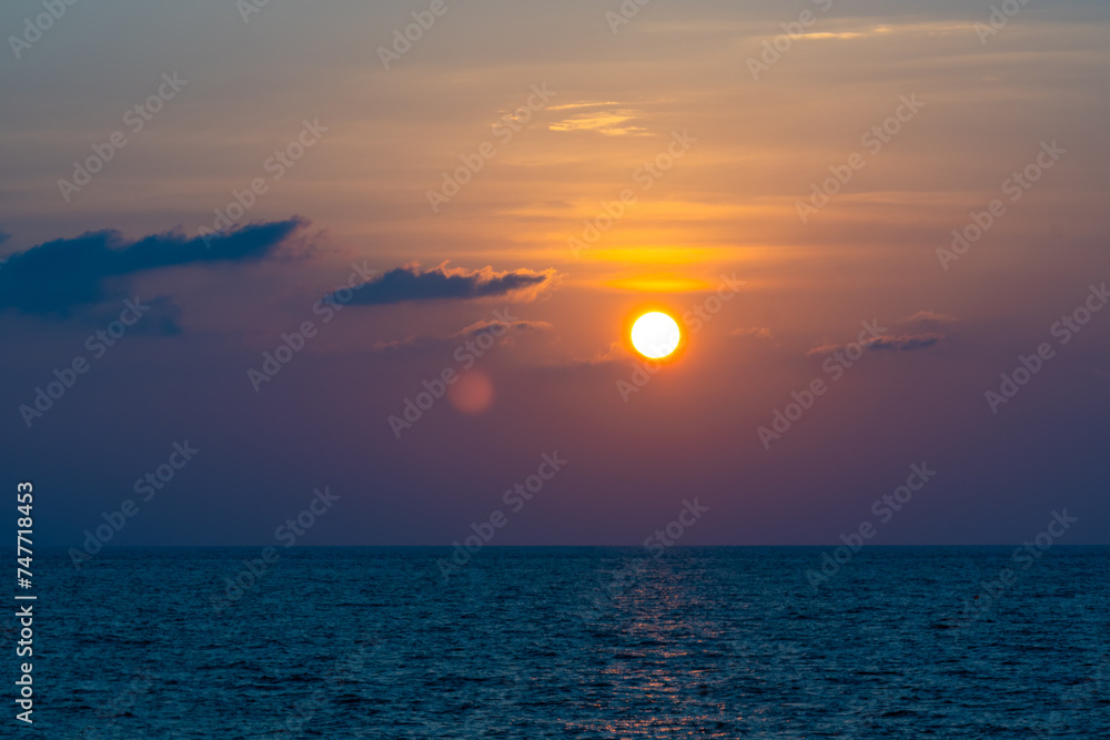 Landscape Sunset sky,Nature beautiful Light Sunset or sunrise over sea,Colorful dramatic majestic scenery sunset Sky with Amazing clouds and waves in sunset sky,Nature light cloud background