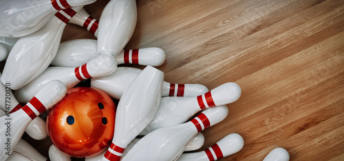 Photography Bowling balls and bowling pins placed on a wooden background.