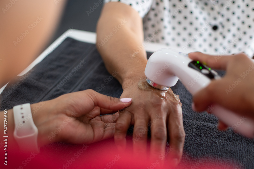 Closeup of ultrasound gel therapy as arthritis treatment