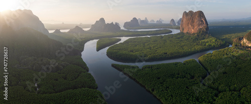 Aerial sunrise view of mangrove forest and mountain peak of Phang nga bay - Thailand photo