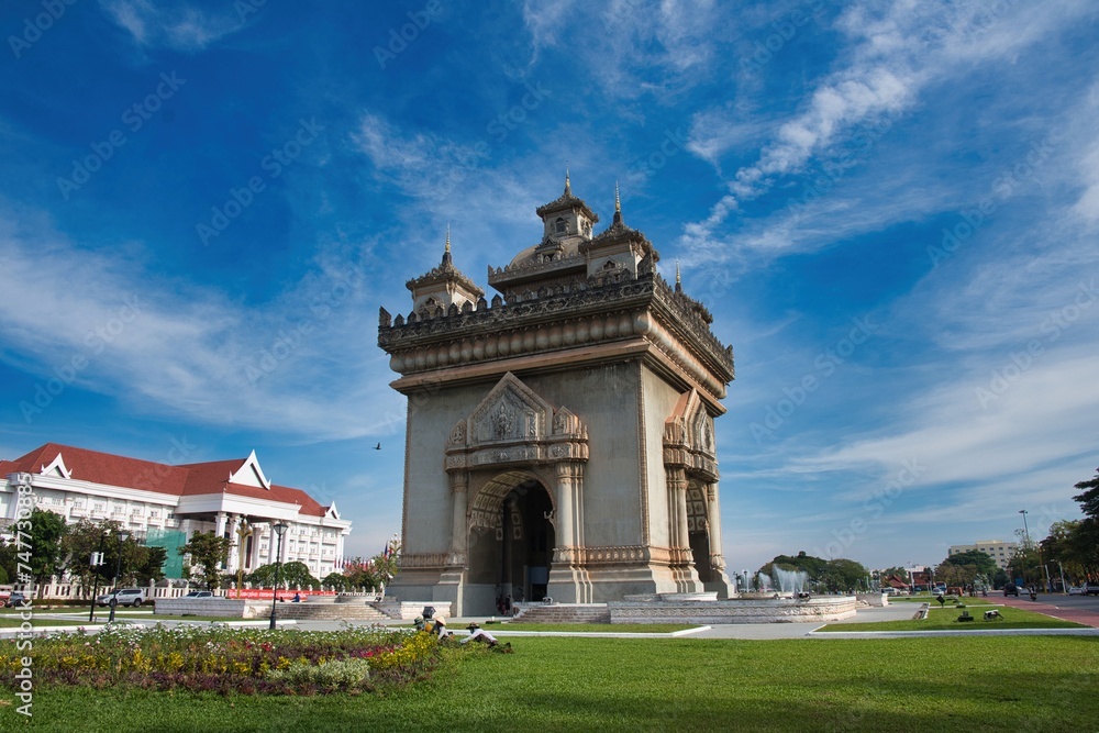 Obraz premium Patuxai a memorial monument in Vientiane Laos. Patuxai Gate in the Thannon Lanxing area Victory Gate Monument Laos Flag