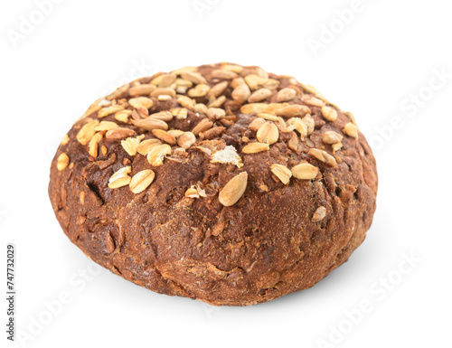 Fresh whole grain bun with seeds on white background