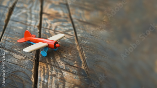 Plane toy on the table, transportation and business concept
