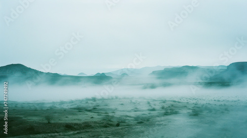 analogue still high angle shot of a foggy Dessert landscape