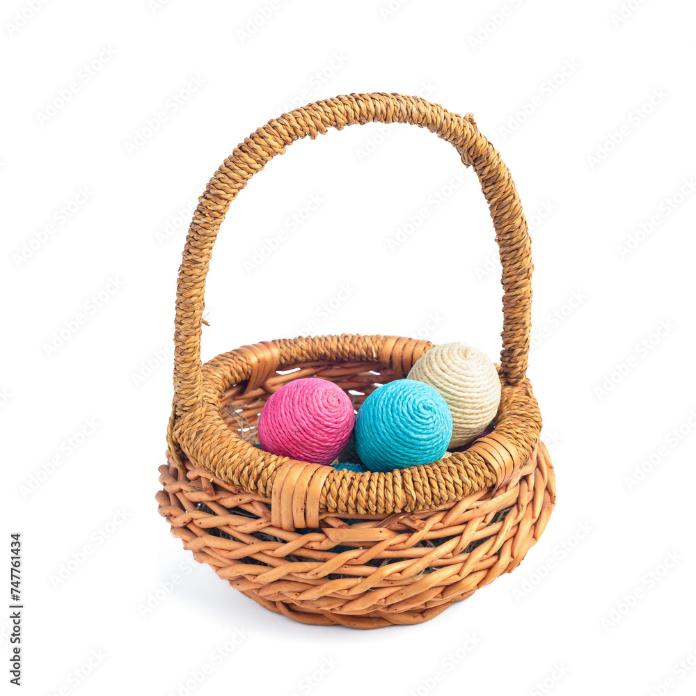 Wicker basket isolated on white background. Easter eggs. Wicker basket isolated on white background. Easter eggs.