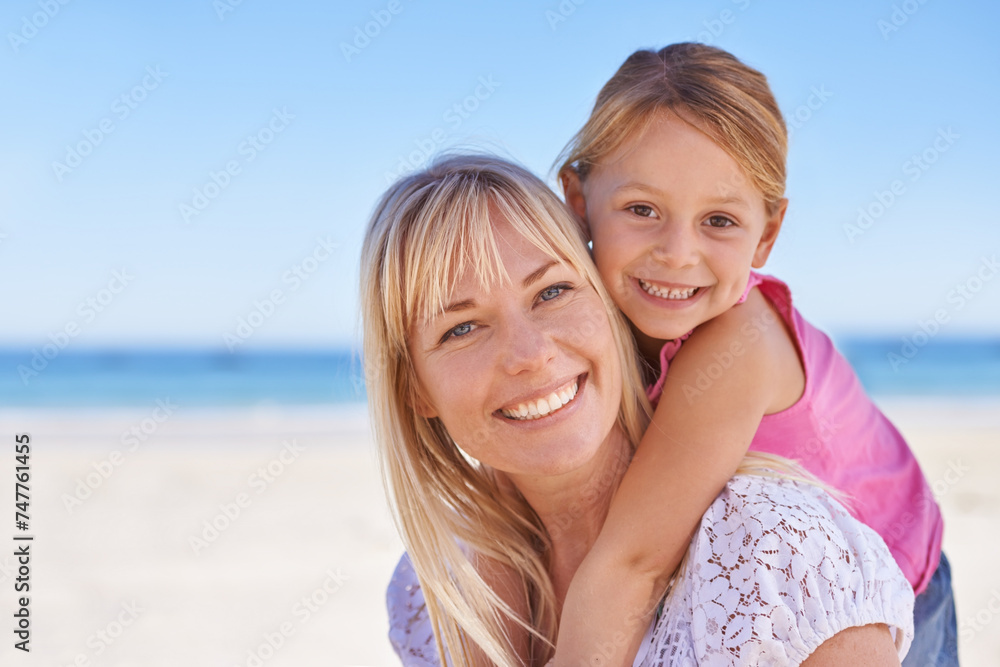 Portrait, mother and happy kid on beach for holiday, summer or vacation on mockup space with piggyback. Face, mom and smile of girl at ocean for adventure, travel or family bonding together outdoor
