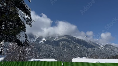 Winter beauty snow in Pahalgam, Kashmir: A Snowy Adventure in the Himalayan Region Anantnag - snow on roads, Snowboarding, and Majestic View photo
