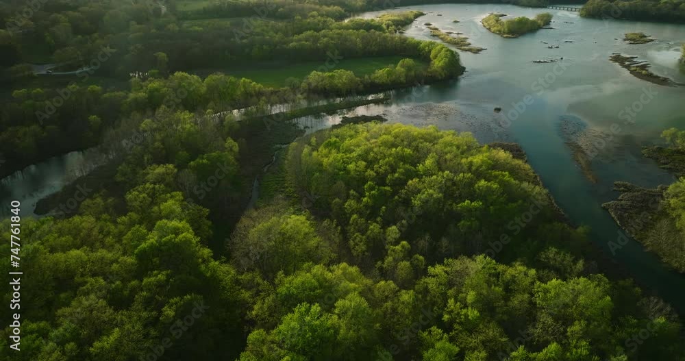 Sunset aerial view over Lake Sequoyah with lush greenery, serene waters Sunset aerial view over Lake Sequoyah with lush greenery, serene waters