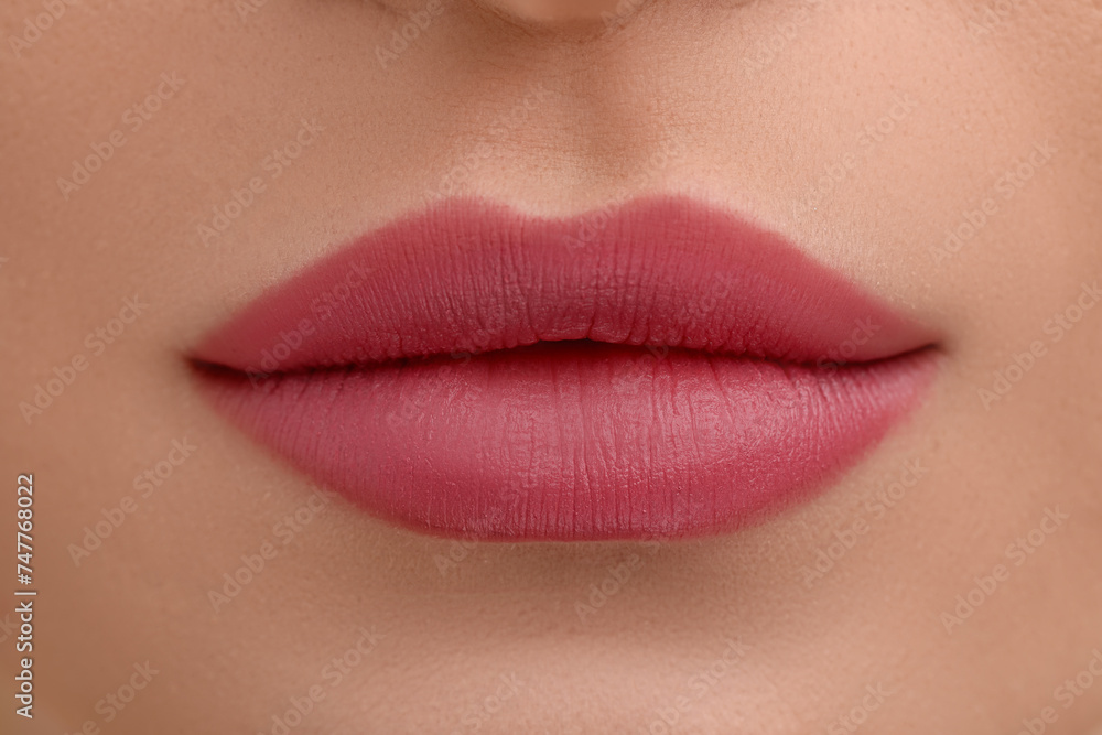 Young woman with beautiful full lips as background, closeup Young woman with beautiful full lips as background, closeup