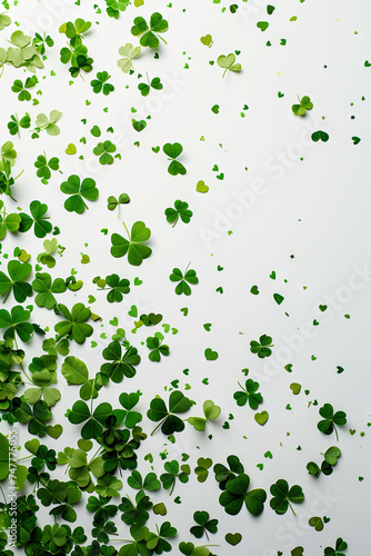 Green Clovers or Shamrocks and confetti white Background for St. Patrick's Day Holiday