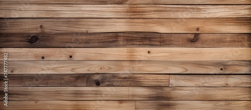 This image showcases a detailed close-up of a wooden wall constructed with overlapping planks. The texture and intricate patterns of the natural wood are clearly visible,