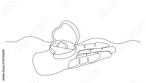 Continuous single line sketch drawing of hand holding wedding couple rings in open elegant box. One line art of engagement and love marriage symbol vector illustration