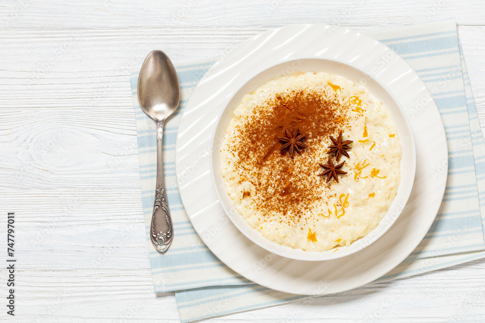 rizogalo, creamy greek rice pudding in a bowl rizogalo, creamy greek rice pudding in a bowl