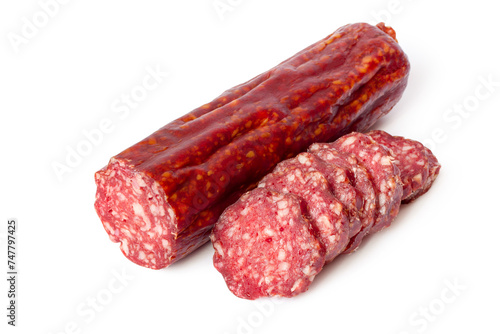 Sliced dry smoked sausage on white background. Fresh meat sausage.
