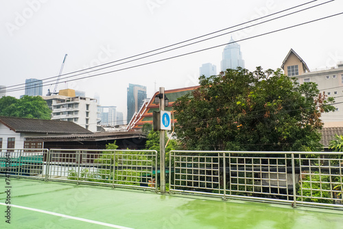 Photography Round bicycle sign on the green bridge bicycle path in tokyo city