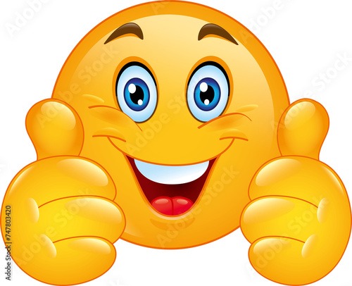 Fotografie A cheerful winking yellow smiley face with two thumbs up