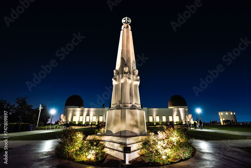 The Astronomers Monument in front of Griffith Observatory at Night - Los Angeles, California