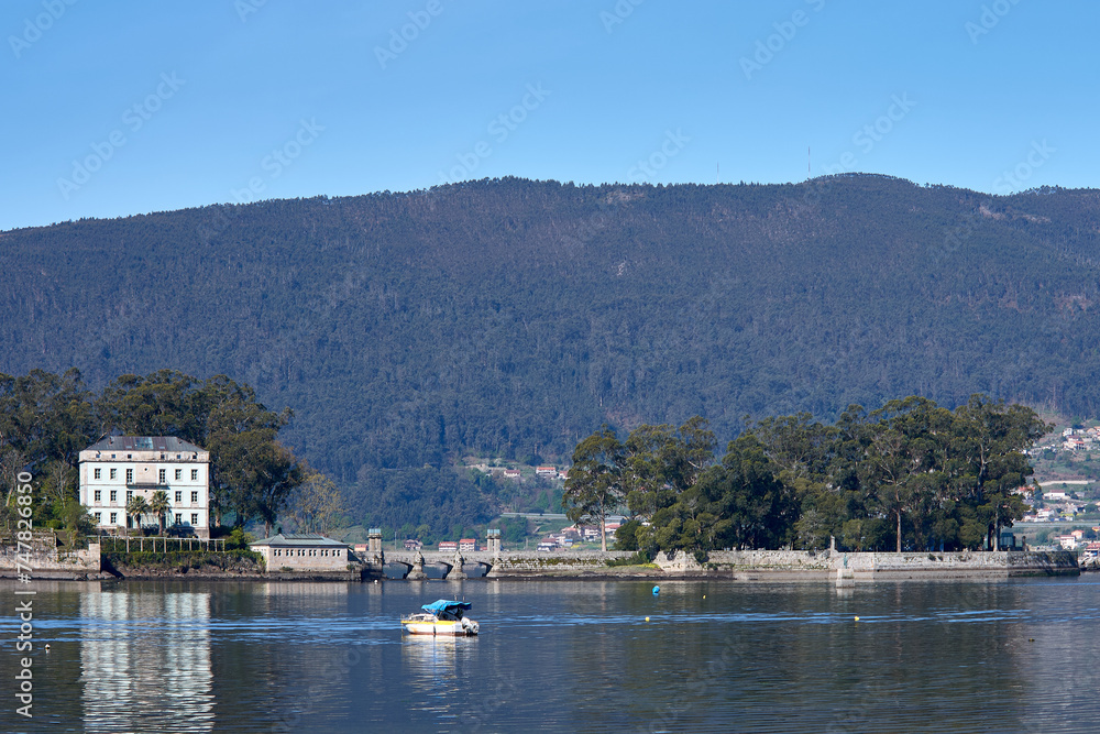 View of San Simon Island from Cesantes beach in the Vigo estuary, Galicia, Spain