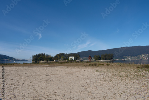 View of San Simon Island from Cesantes beach in the Vigo estuary, Galicia, Spain