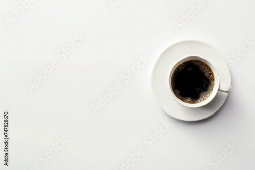 A simple, elegant coffee cup filled with black coffee, against a blank background, emphasizing minimalism and serenity