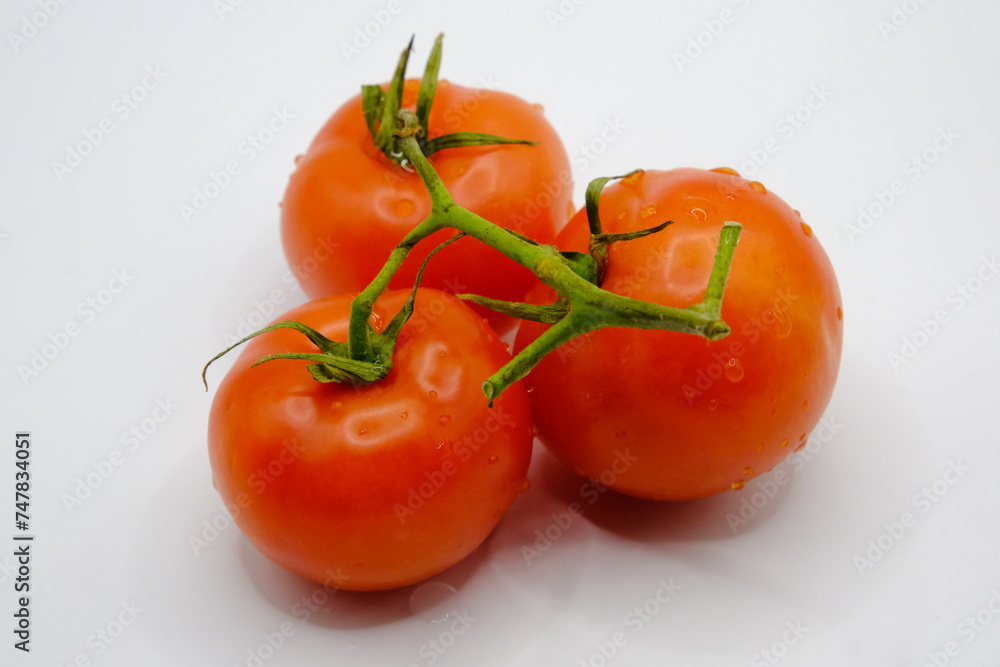 Tomato isolated on white background. Fresh red three tomato with clipping path Tomato isolated on white background. Fresh red three tomato with clipping path