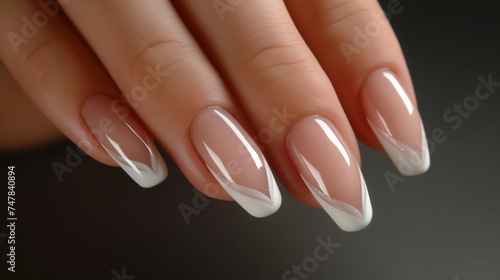 Beautiful manicure  neat nails with whitegel polish