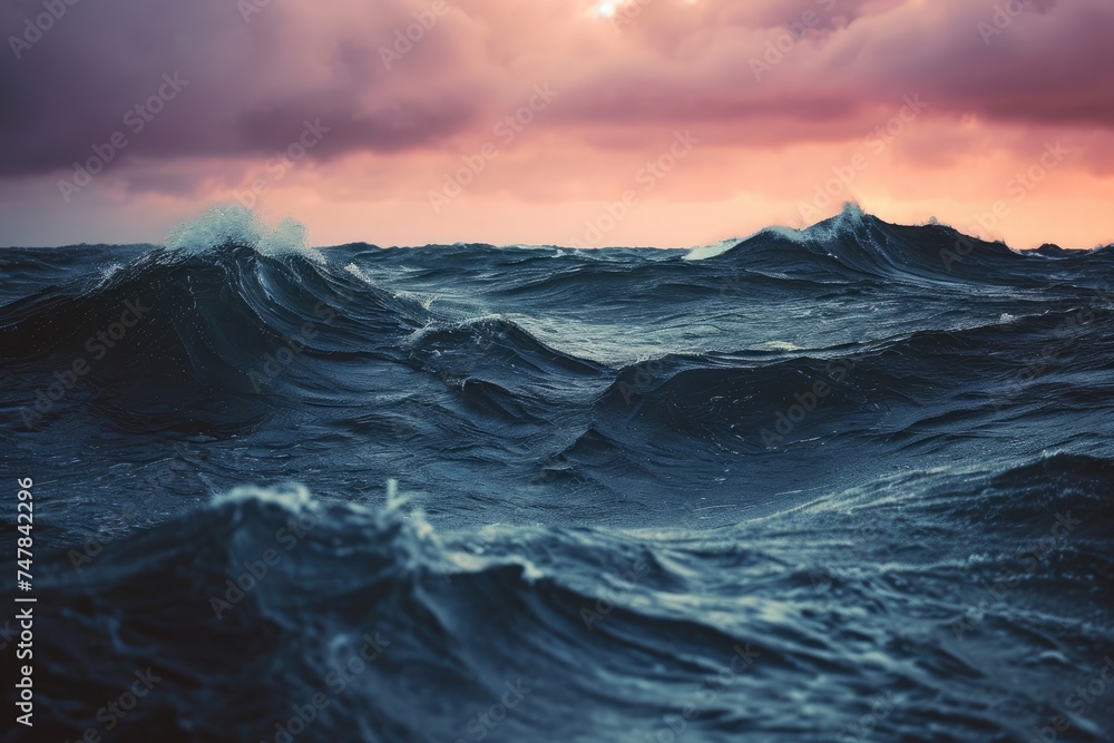 A wide expanse of water stretches out under the cover of a cloudy sky, creating a serene and expansive view, Sharp contrast of dark waves against a pastel sky, AI Generated