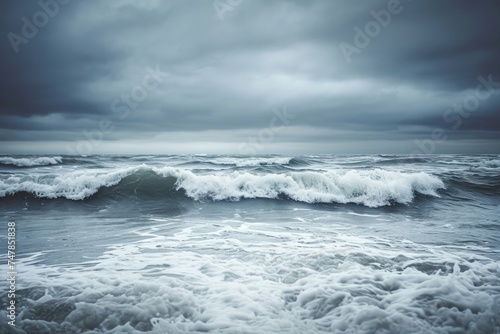 A large body of water with powerful waves crashing against a rocky coastline, Stormy ocean waves under a graying sky, AI Generated
