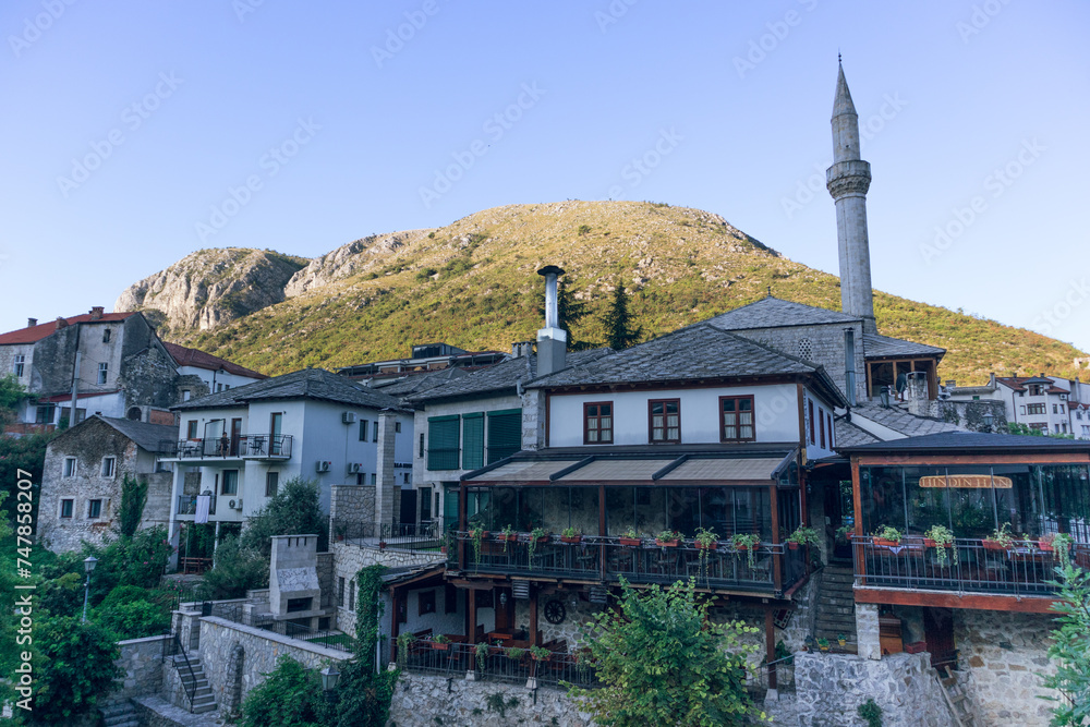 Traditional architecture and a mosque's minaret in Mostar, Bosnia and Herzegovina