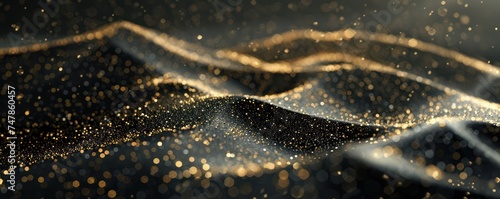 Abstract golden glitter on waves of a dark fluid landscape. Luxury and festive background concept for design and decoration