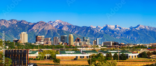 Skyline of Salt Lake City downtown in Utah with Wasatch Range Mountains in the background. photo