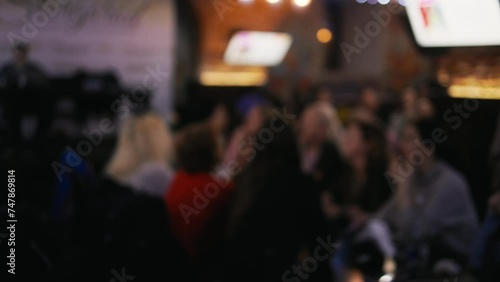 Wallpaper Mural Diverse friend group in a bar, enjoying beer, celebrating, smiling, and participating in a lively quiz game - friendship and togetherness concept Torontodigital.ca