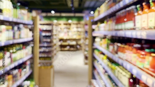 Wallpaper Mural supermarket shelves, blurred background, empty store Torontodigital.ca