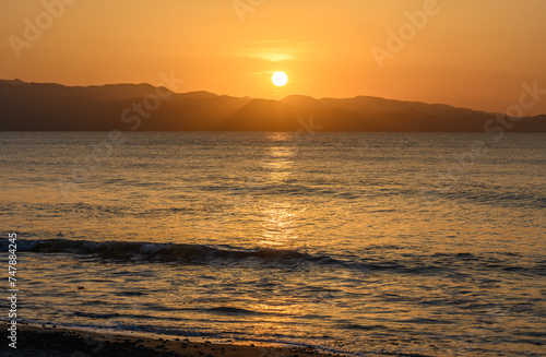 winter sunset on the Mediterranean sea against the backdrop of mountains 8