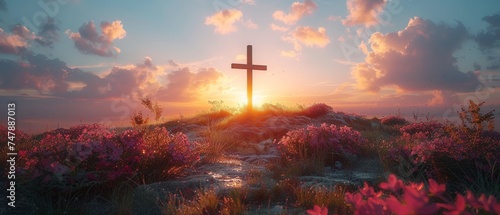 An image of a cross with a robe and crown of thorns on a hill at sunset - concept of Calvary and Resurrection