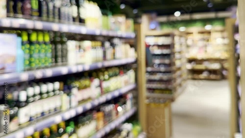 Wallpaper Mural supermarket shelves, blurred background, empty store Torontodigital.ca