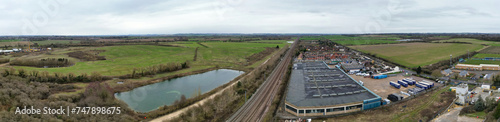 High Angle Ultra Wide Panoramic View of Arseley Town of England UK. The Footage Was Captured During Cloudy and Rainy Day of Feb 28th, 2024 © Nasim