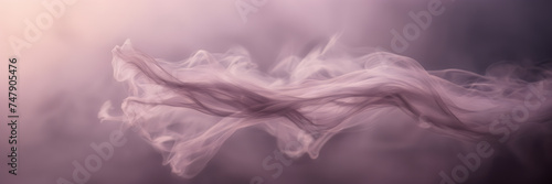 Close-up image highlighting the delicate wisps of smoke gently unfolding against a background of dusky mauve.