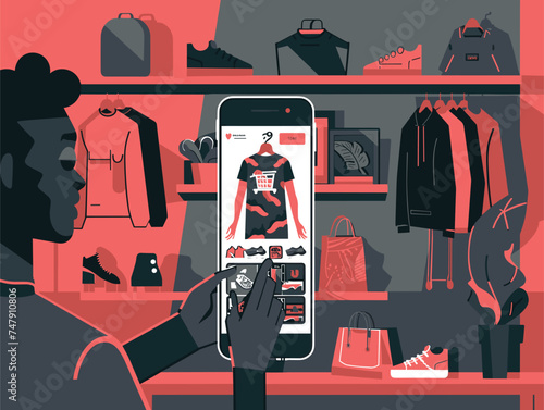 A man is holding a rectangular cell phone in front of a closet full of colorful clothes. The pattern on the sleeves resembles a graphic design with carmine accents